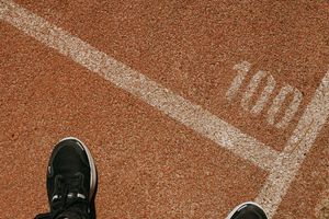 Close up of sports shoes on running track