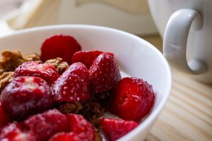 Healthy breakfast and water on a wooden table